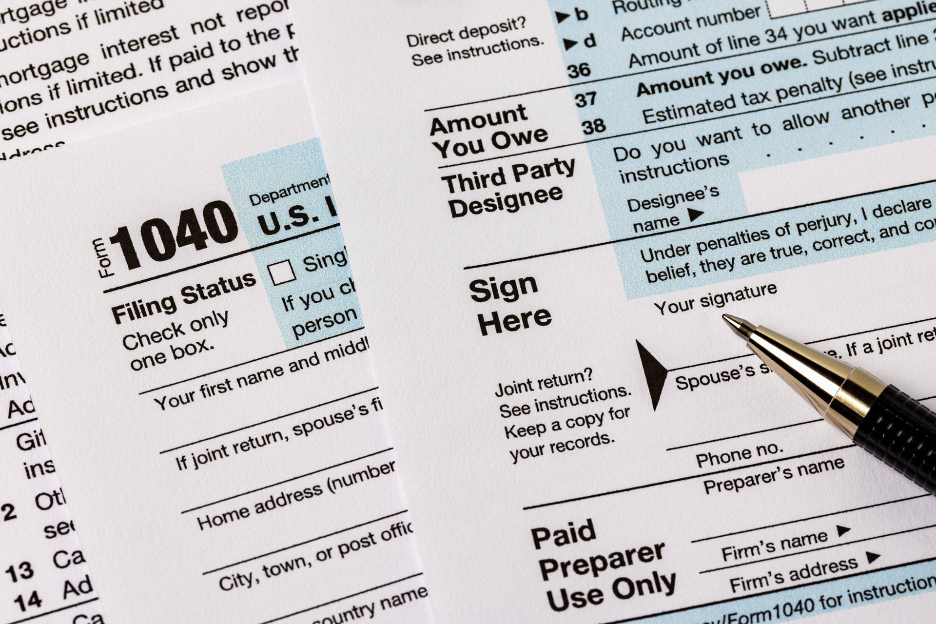 1040 Tax Form and pen