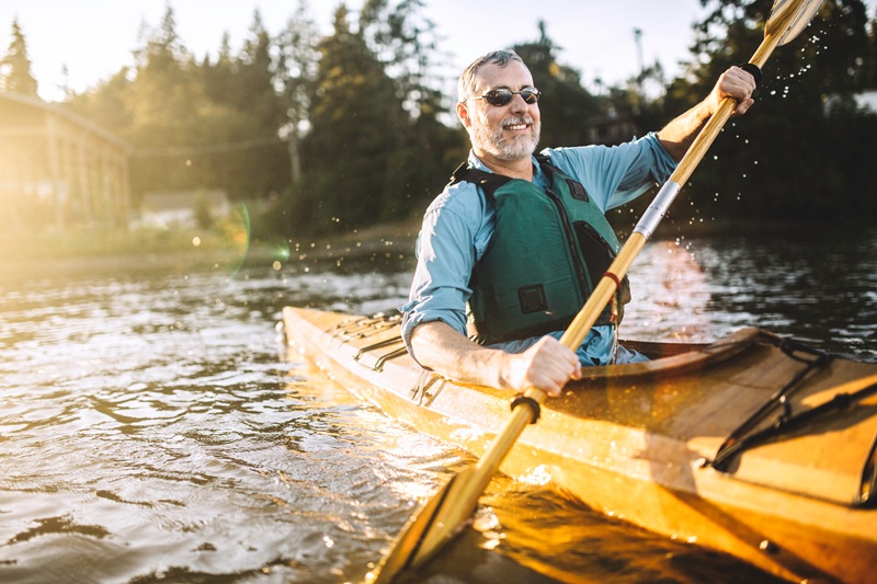 Man rowing a kayak