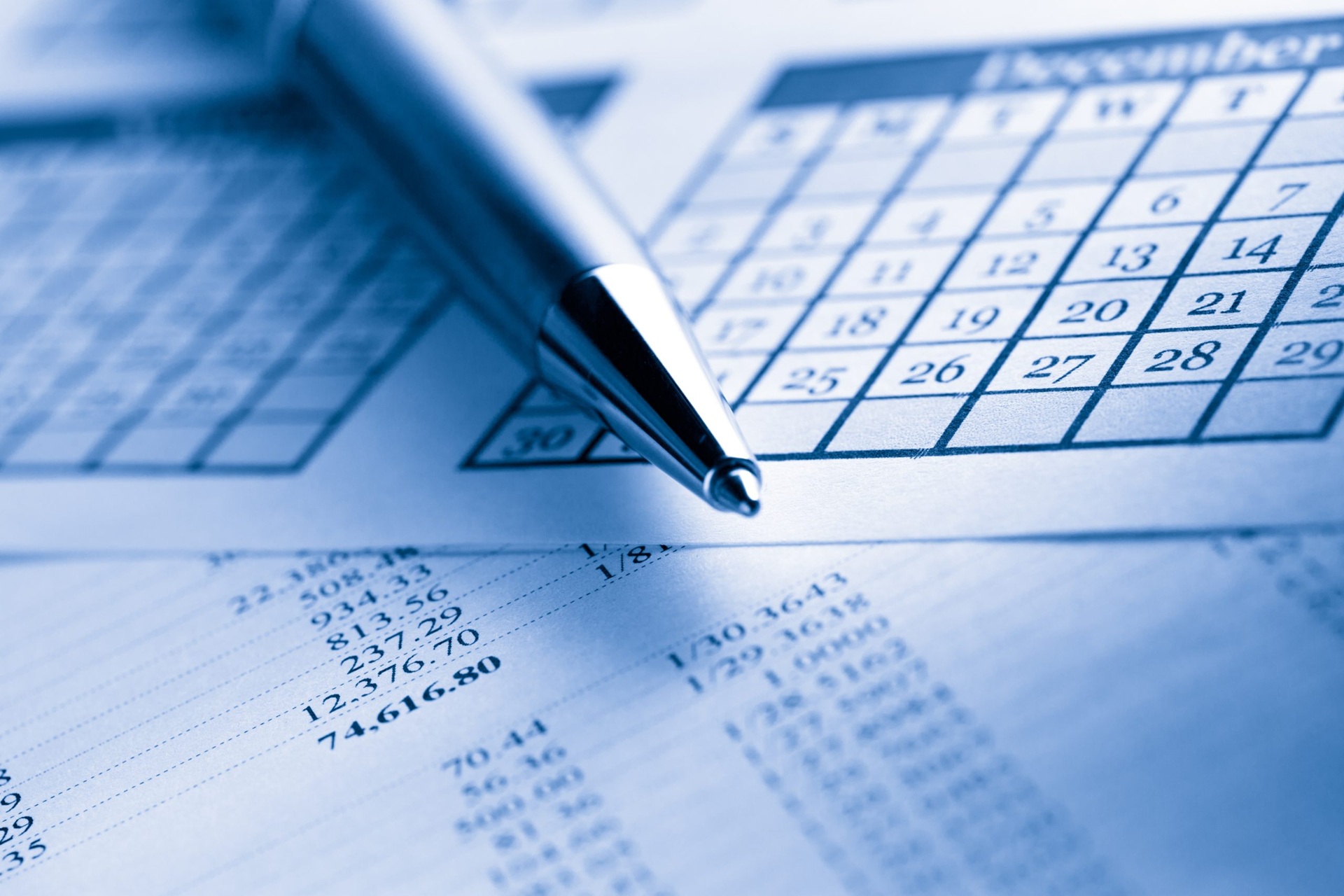 Pen and financial documents